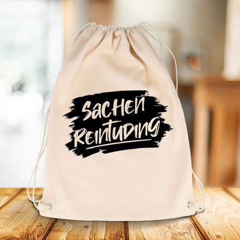Bedruckter Turnbeutel mit Spruch Sachen Reintuding