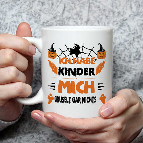 Bedruckte Tasse mit Spruch Ich habe Kinder mich gruselt gar nichts