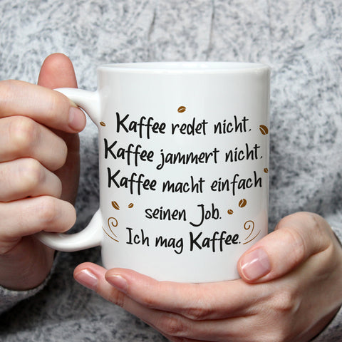 Bedruckte Tasse mit Spruch Kaffee redet nicht