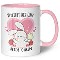 Bedruckte Tasse mit Spruch - Verliebt bis über beide Ohren