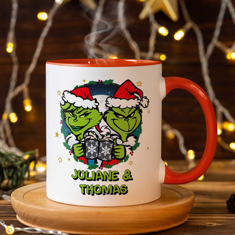 Bedruckte Tasse mit Weihnachtsmotiv - Grinch Paar mit Namen