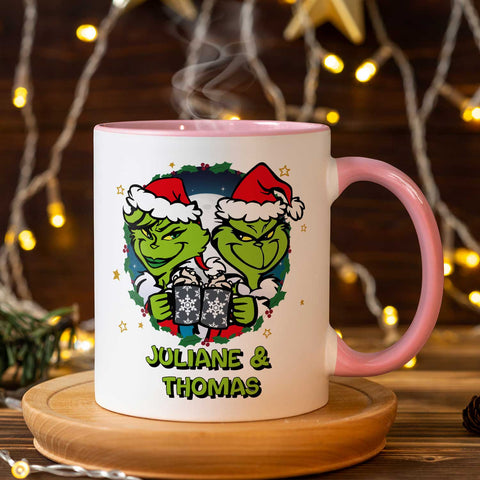 Bedruckte Tasse mit Weihnachtsmotiv - Grinch Paar mit Namen