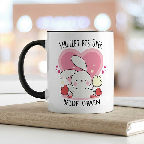 Bedruckte Tasse mit Spruch - Verliebt bis über beide Ohren