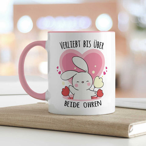 Bedruckte Tasse mit Spruch - Verliebt bis über beide Ohren