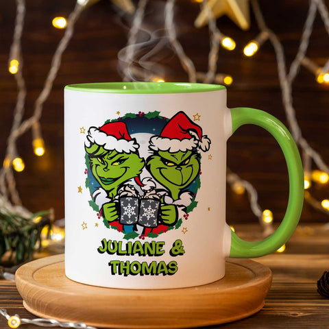 Bedruckte Tasse mit Weihnachtsmotiv - Grinch Paar mit Namen
