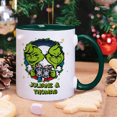 Bedruckte Tasse mit Weihnachtsmotiv - Grinch Paar mit Namen