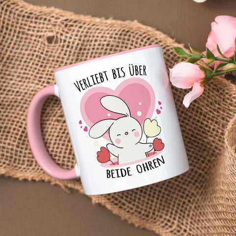 Bedruckte Tasse mit Spruch - Verliebt bis über beide Ohren