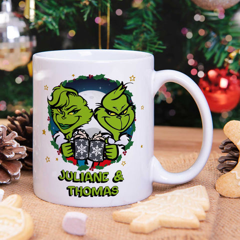 Bedruckte Tasse mit Weihnachtsmotiv - Grinch Paar mit Namen