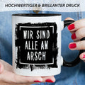 Bedruckte Tasse mit Spruch - "Wir sind alle am Arsch"