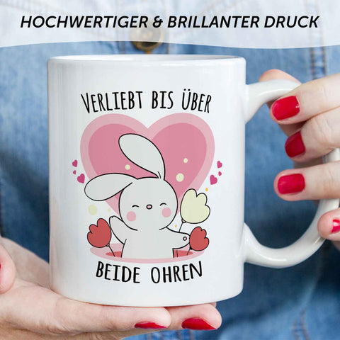 Bedruckte Tasse mit Spruch - Verliebt bis über beide Ohren