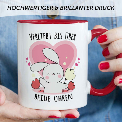 Bedruckte Tasse mit Spruch - Verliebt bis über beide Ohren