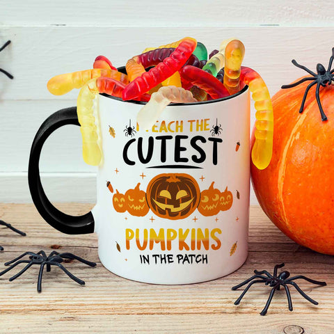 Bedruckte Tasse mit Spruch I teach the cutest Pumpkins