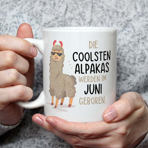 Bedruckte Tasse mit Spruch Die coolsten Alpakas