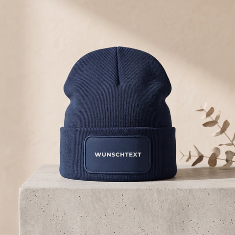 Personalisierte Mütze in Navy mit weißem Wunschtext